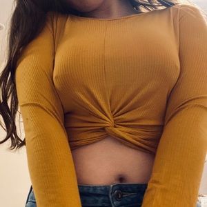 Yellow cropped long sleeve shirt